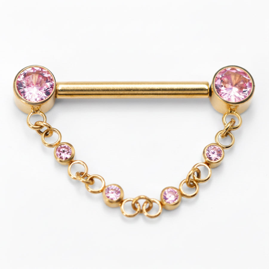 piercing téton titane doré avec chaîne pendante zircons roses système à pression