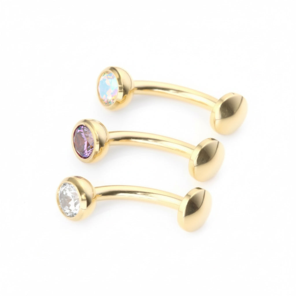 piercing nombril labret courbé titane doré PVD gold zircon reflets aurore boréale AB vissage interne